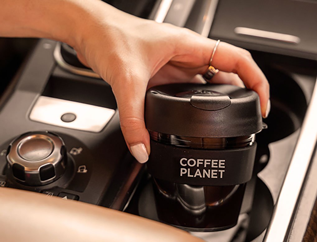 A laptop showing a successful social media campaign for a coffee brand